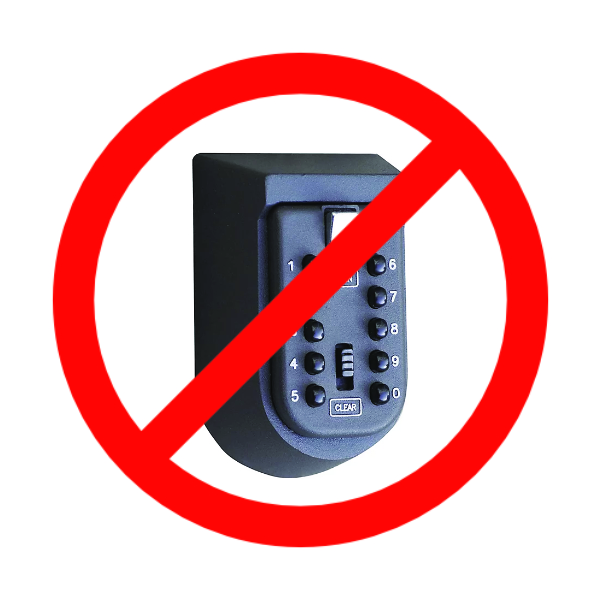 A key box, covered with a red circle-slash "not allowed" symbol